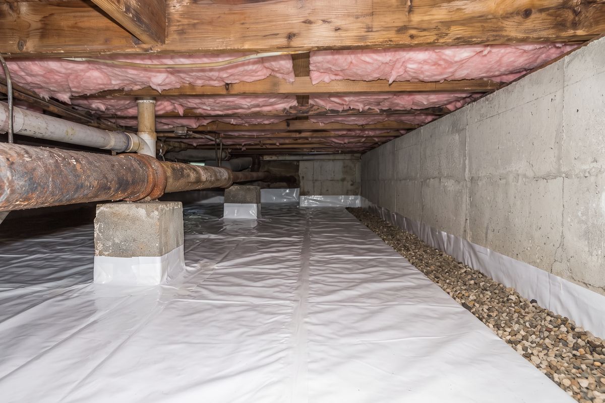 Wet, muddy crawl space, after the work